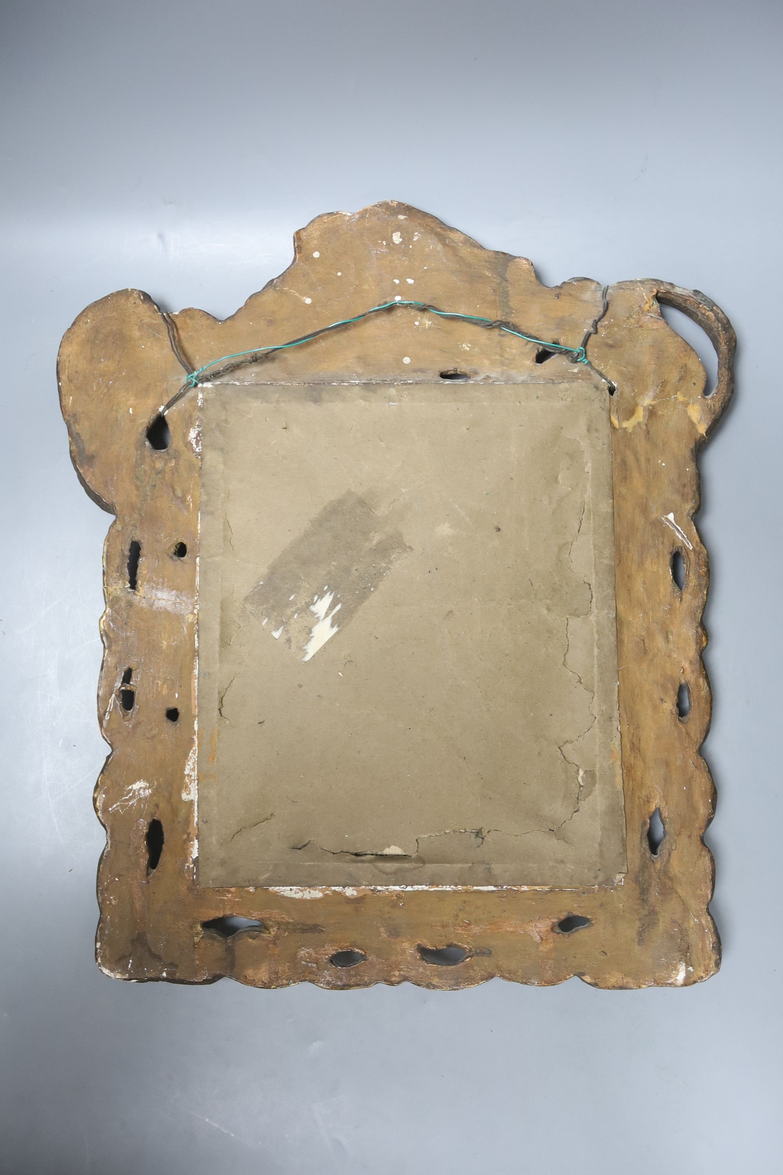 A 19th century gilt composition rectangular mirror in the Baroque style